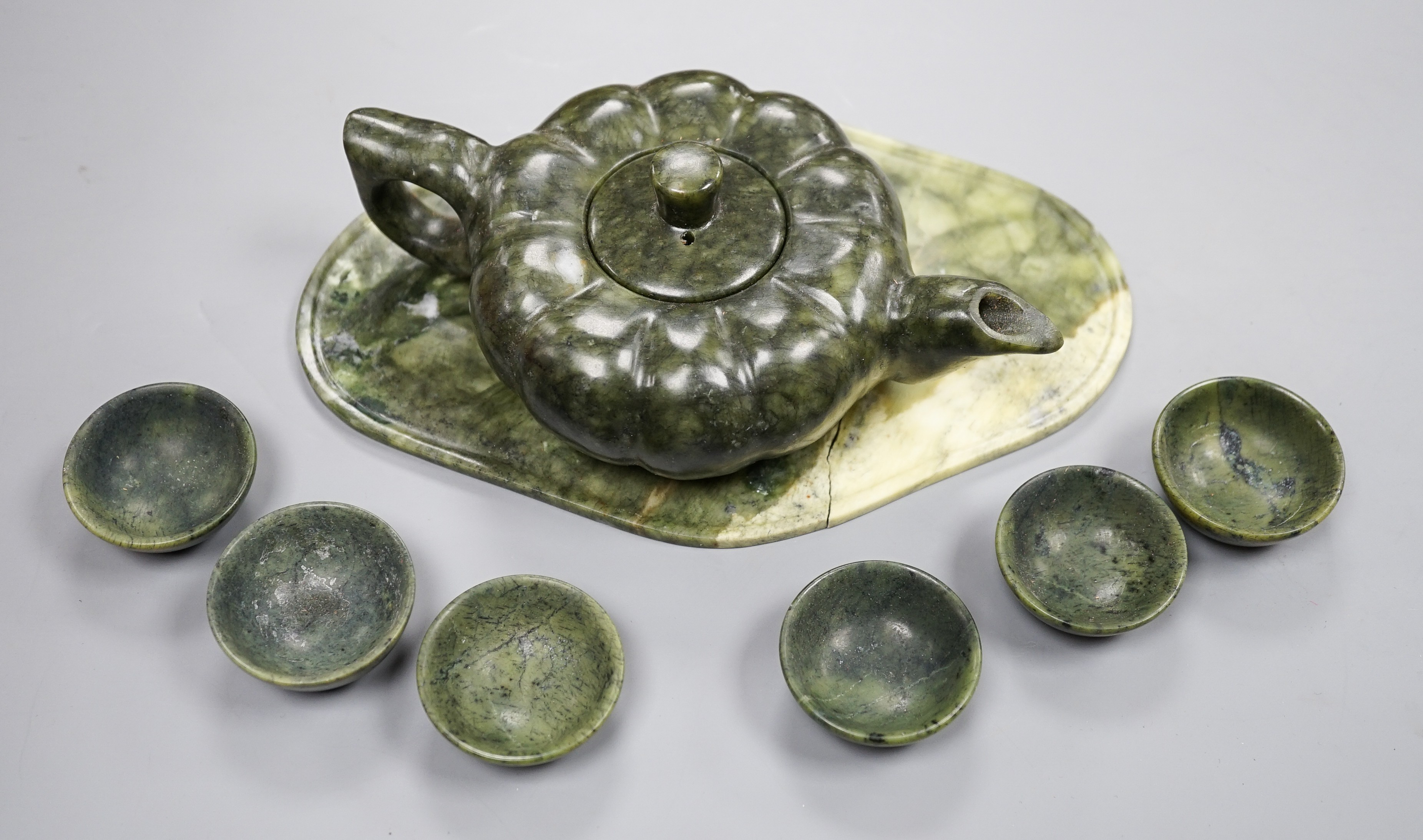 A spinach green jade melon shaped Chinese teapot and six cups (boxed)
